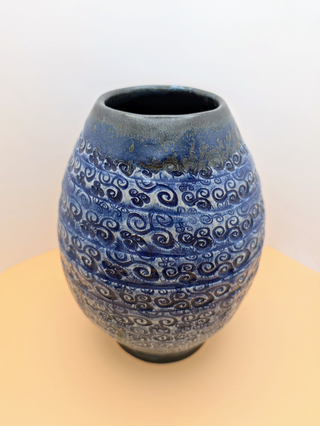 Large blue vase with textured swirls