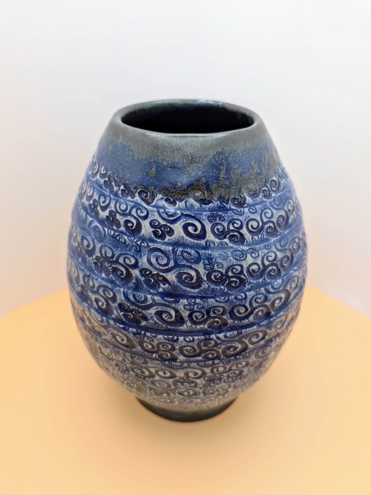 Large blue vase with textured swirls