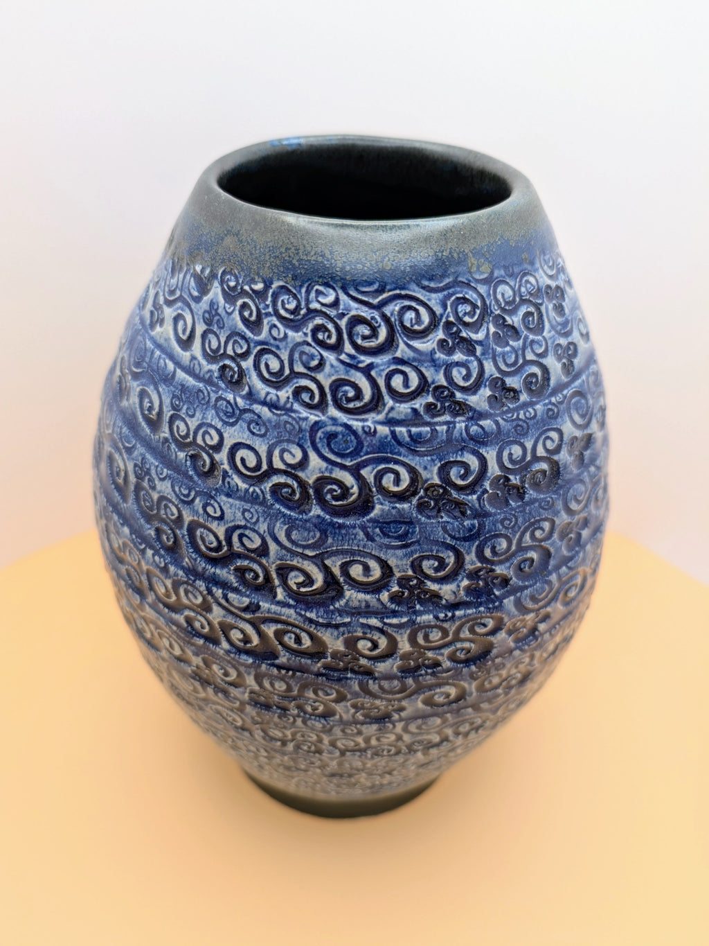 Large blue vase with textured swirls