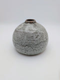 Short, bulbous vase with thick, complex glaze effects