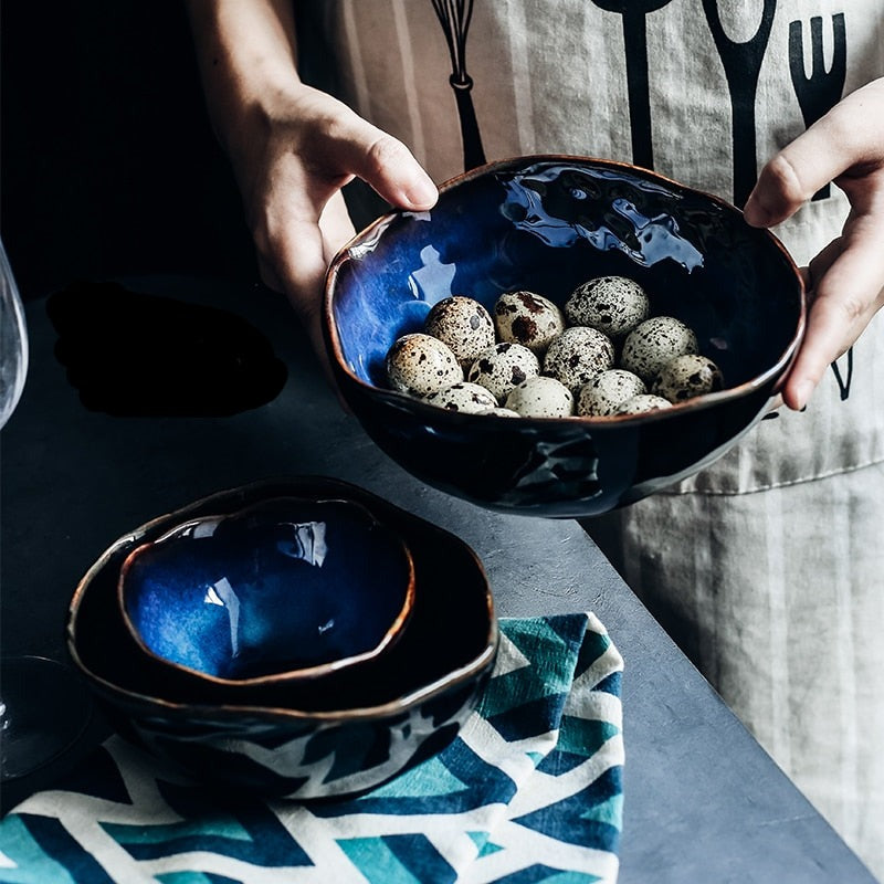Artful Ocean-Inspired Dining Bowl: Deep Blue Glaze and Rugged Texture